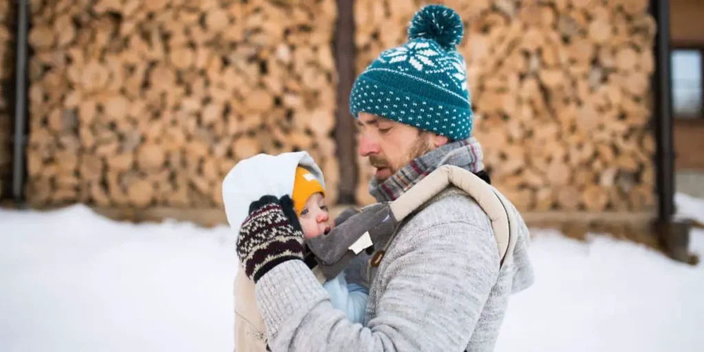 father and child during winter