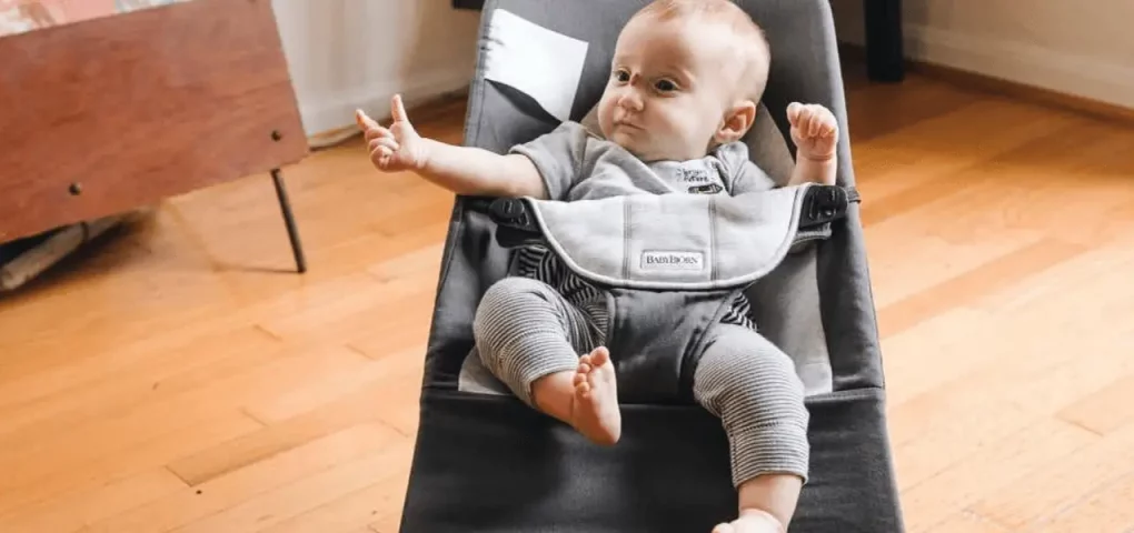 when to stop using a baby swing