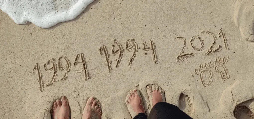 announcing pregnancy_years written in the sand